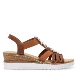 Sandały Rieker. Brązowe sandały damskie Rieker, bez wzorów, bez obcasa, na koturnie, bez zapięcia. Za 299.99 zł.