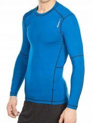 Koszulka sportowa męska REEBOK długi rękaw. Niebieskie koszulki sportowe męskie Reebok, m, bez wzorów, z elastanu, bez kołnierzyka, bez ramiączek, na fitness i siłownię. Za 95.00 zł.