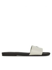 Calvin Klein Jeans Klapki Flat Sandal Slide Mg YW0YW01697 Biały. Białe klapki damskie Calvin Klein Jeans, bez wzorów, z jeansu, bez obcasa. Za 209.99 zł.