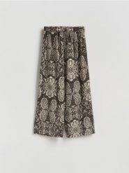 Wzorzyste spodnie - ciemnobrązowy. Brązowe spodnie materiałowe damskie Reserved, l, bez wzorów, z tkaniny. Za 119.99 zł.