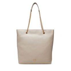 Torebka Calvin Klein. Brązowe torebki do ręki damskie Calvin Klein, bez wzorów, klasyczne, bez dodatków. Za 389.99 zł.