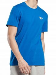 Koszulka na co dzień męska REEBOK bawełniana. Niebieskie koszulki sportowe męskie Reebok, m, bez wzorów, z bawełny, bez kołnierzyka, bez ramiączek. Za 76.00 zł.