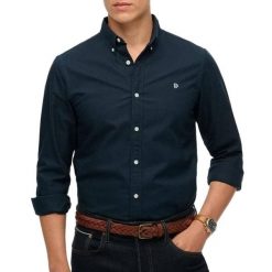 Koszula z długim rękawem Superdry Preppy Oxford. Niebieskie koszule męskie Superdry., xl, bez wzorów, z bawełny, klasyczne, bez kołnierzyka, bez ramiączek. Za 243.00 zł.