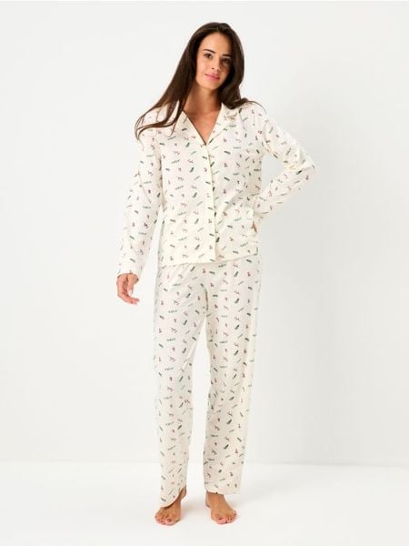 Bawełniana piżama dwuczęściowa ze wzorem - kremowy. Białe piżamy damskie Sinsay, l, bez wzorów, z bawełny, bez ramiączek. Za 79.99 zł.