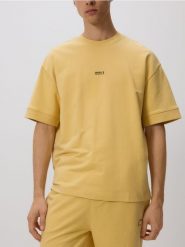 T-shirt boxy z nadrukiem - jasnożółty. Żółte t-shirty męskie Reserved, l, bez wzorów, z bawełny, bez kołnierzyka. Za 89.99 zł.