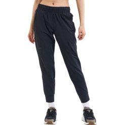 Spodnie sportowe damskie Under Armour Unstoppable Jogger. Czarne spodnie dresowe damskie Under Armour, xl, bez wzorów, z dresówki. Za 511.00 zł.