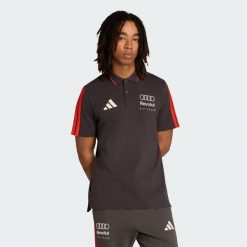 KOSZULKA POLO AUDI REVOLUT F1 TEAM DNA. Czarne koszulki polo męskie Adidas, l, bez wzorów, z bawełny, bez kołnierzyka, bez ramiączek. Za 219.00 zł.