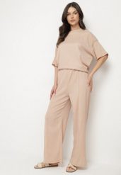Beżowy Komplet o Kroju Oversize Szerokie Spodnie i T-shirt Natelera. Brązowe spodnie materiałowe damskie Born2be, uniwersalny, bez wzorów. Za 89.99 zł.