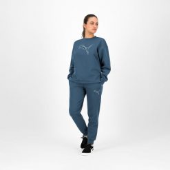 Bluza damska Puma Gym & Pilates. Niebieskie bluzy sportowe damskie Puma, bez wzorów, z bawełny, na fitness i siłownię. Za 119.99 zł.