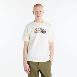 Koszulka męska New Balance MT51900AGA – beżowa. Brązowe koszulki sportowe męskie New Balance, m, bez wzorów, z dresówki, bez kołnierzyka, bez ramiączek. Za 179.99 zł.