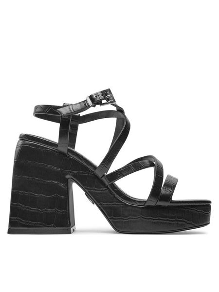 Buffalo Sandały Sydney Miss 1291578 Czarny. Czarne klapki damskie Buffalo, bez wzorów, ze skóry, bez obcasa, na słupku, bez zapięcia. Za 569.99 zł.