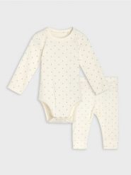 Bawełniany komplet prążkowany z body i legginsami w kropki - kremowy. Białe body niemowlęce Sinsay, bez wzorów, z bawełny, bez ramiączek. Za 22.99 zł.