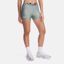 Spodenki damskie Under Armour HG Authentics. Zielone obuwie sportowe damskie Under Armour, m, bez wzorów, sportowe, na fitness i siłownię. Za 69.99 zł.