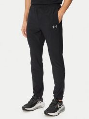 Under Armour Spodnie dresowe Tech™ Utility 6013802 Czarny Regular Fit. Czarne spodnie sportowe męskie Under Armour, m, bez wzorów, z dresówki, na fitness i siłownię. Za 339.99 zł.