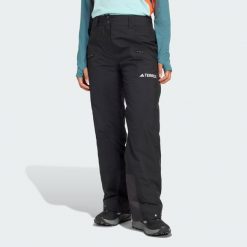 Ocieplane spodnie Terrex Multi 2 Layer CLIMAPROOF. Czarne spodnie materiałowe damskie Adidas, bez wzorów, narciarskie, climaproof (adidas). Za 899.00 zł.