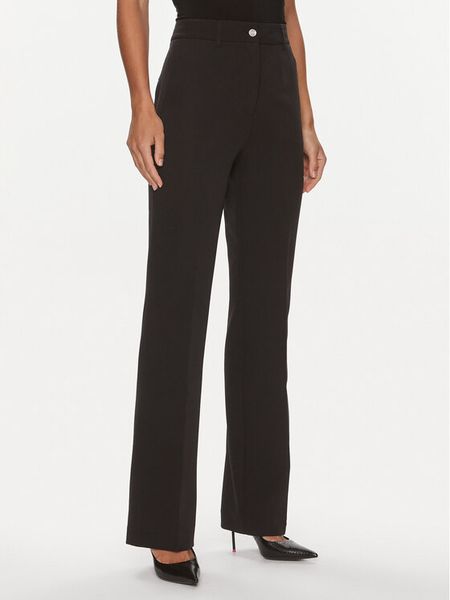 Guess Spodnie materiałowe W4RB30 WFWX2 Czarny Slim Fit. Czarne spodnie materiałowe damskie Guess, m, z aplikacjami, z materiału. Za 249.99 zł.