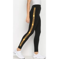 Pomarańczowe Legginsy Gold Gym. Legginsy sportowe damskie Born2be. Za 9.99 zł.