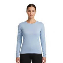 Damska koszulka 100% wełna merynosa z długim rękawem - Bjork 210. Niebieskie t-shirty damskie FJORK MERINO, bez wzorów, z materiału, klasyczne, bez kołnierzyka. Za 279.00 zł.