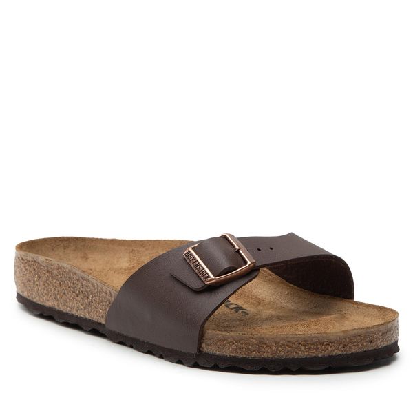 Klapki Birkenstock. Brązowe klapki damskie Birkenstock, bez wzorów, bez obcasa. Za 323.99 zł.