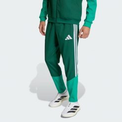 Spodnie Algeria 26 Presentation. Zielone spodnie sportowe męskie Adidas, bez wzorów, z tkaniny, do piłki nożnej. Za 279.00 zł.