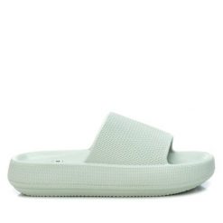 Sandały Xti 44489-AQUA dla kobiet. Białe sandały damskie Xti, bez wzorów, z materiału, bez obcasa, bez zapięcia. Za 128.30 zł.