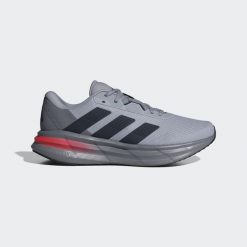 Buty Galaxy 7 Running. Niebieskie buty sportowe męskie Adidas, z syntetyku, bez zapięcia, do biegania. Za 232.25 zł.