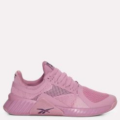 Damskie buty treningowe Reebok FLIP CHARGE 100272256 fioletowe. Fioletowe obuwie sportowe damskie Reebok, bez wzorów, na fitness i siłownię. Za 303.00 zł.