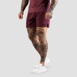 Szorty męskie fitness regular bakłażanowe TRN. Czerwone krótkie spodenki sportowe męskie GYMBEAM, m, bez wzorów, z materiału, do biegania. Za 83.90 zł.