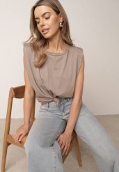 Beżowy Bawełniany Top Oversize Bez Rękawów z Wiązaniem i Poduszkami w Ramionach Apixie. Brązowe koszule damskie Born2be, bez wzorów, z bawełny, eleganckie, bez kołnierzyka, bez ramiączek. Za 69.99 zł.