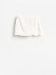 Spódnico-szorty z wiskozą - biały. Białe szorty damskie Reserved, l, bez wzorów, z tkaniny. Za 119.99 zł.