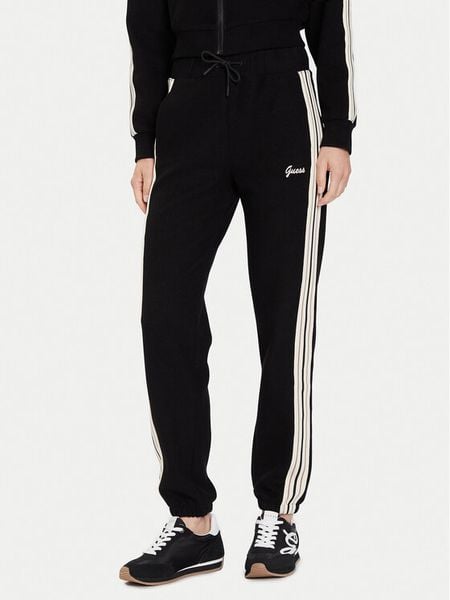 Guess Spodnie dresowe V5BB17 KCX52 Czarny Regular Fit. Czarne spodnie dresowe damskie Guess, xl, z aplikacjami, z dresówki. Za 209.99 zł.
