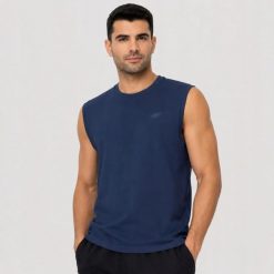 KOSZULKA MĘSKA BEZ RĘKAWÓW 4F TANK TOP TSLEM016 M. Niebieskie t-shirty męskie 4f, m, bez wzorów, z bawełny, sportowe, bez kołnierzyka. Za 37.15 zł.