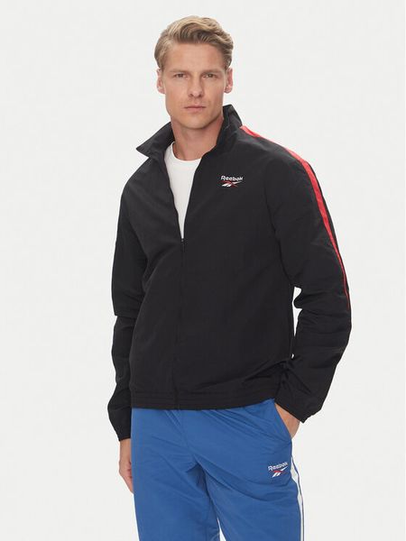 Reebok Kurtka przejściowa 100215495 Czarny Regular Fit. Czarne kurtki męskie Reebok, m, bez wzorów, z syntetyku, bez kaptura. Za 106.99 zł.