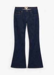 Dżinsy z rozszerzanymi nogawkami, mid waist. Niebieskie jeansy damskie bonprix. Za 169.99 zł.