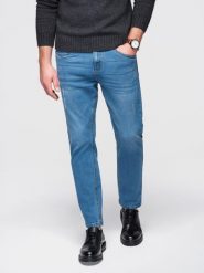 Męskie jeansowe z przetarciami REGULAR FIT - niebieskie V3. Niebieskie spodnie materiałowe męskie Ombre Clothing, m, z aplikacjami, z bawełny, biznesowe. Za 239.99 zł.