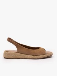 Jasnobrązowe wsuwane sandały. Brązowe sandały damskie Brawo sp. z o.o., bez wzorów, ze skóry, bez obcasa, na koturnie, bez zapięcia. Za 399.99 zł.