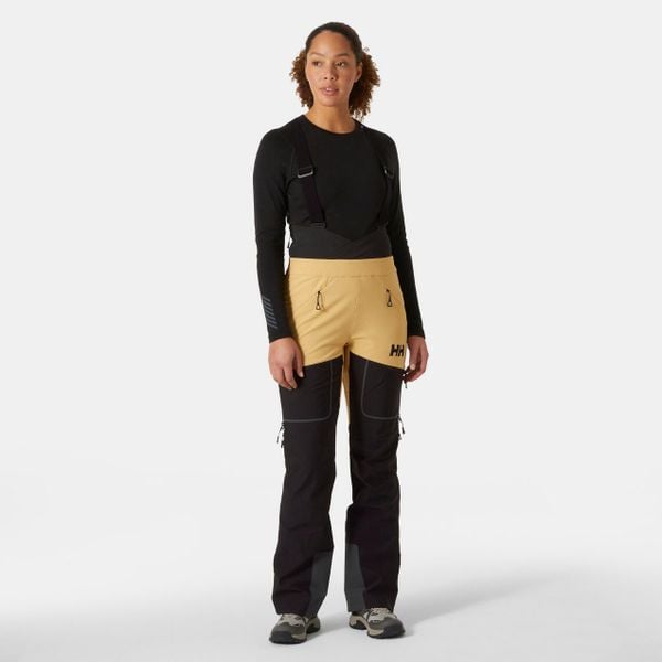 Damskie spodnie narciarskie na szelkach Helly Hansen Odin BC Softshell. Brązowe spodnie materiałowe damskie Helly Hansen, bez wzorów, z softshellu. Za 1,535.50 zł.