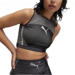 Koszulki Puma Model To Crop Top Kolor Czarny. Czarne koszulki sportowe damskie Puma, bez wzorów, z tkaniny, bez kołnierzyka, bez ramiączek. W wyprzedaży za 126.75 zł.