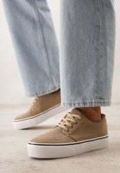 Ciemnobeżowe Klasyczne Tenisówki z Ozdobnym Paskiem przy Podeszwie Ranora. Brązowe obuwie sportowe damskie Born2be, bez wzorów, z dresówki, klasyczne, bez zapięcia. Za 49.99 zł.