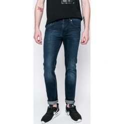 Lacoste - Jeansy. Niebieskie jeansy męskie Lacoste. W wyprzedaży za 369.90 zł.