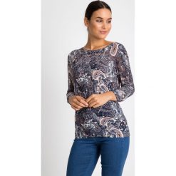 Lekki sweter z orientalnym wzorem QUIOSQUE. Swetry damskie marki QUIOSQUE. W wyprzedaży za 89.99 zł.