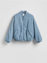 Kurtka bomber - jasnoniebieski. Niebieskie kurtki damskie Reserved, l, bez wzorów, z tkaniny, bez kaptura. Za 199.99 zł.