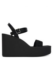 Calvin Klein Sandały Wedge 70 Sndl Webbing Lth HW0HW02882 Czarny. Czarne sandały damskie Calvin Klein, bez wzorów, z materiału, bez obcasa, na koturnie, bez zapięcia. Za 449.99 zł.