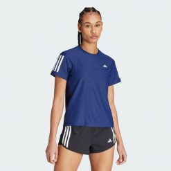 Koszulka Own The Run. Niebieskie koszulki sportowe damskie Adidas, xs, bez wzorów, z materiału, sportowe, bez kołnierzyka. Za 159.00 zł.