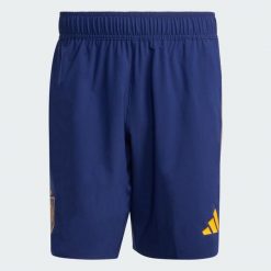 Szorty Hiszpania Tiro Travel. Niebieskie krótkie spodenki sportowe męskie Adidas, bez wzorów, do piłki nożnej. Za 219.00 zł.