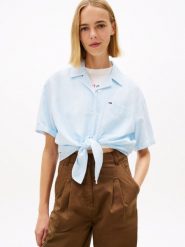 Tommy Jeans bluzka kopertowa z lnem Kobiety len niebieski, S. Niebieskie bluzki damskie Tommy Jeans, s, bez wzorów, z jeansu, bez kołnierzyka, bez ramiączek. Za 279.95 zł.