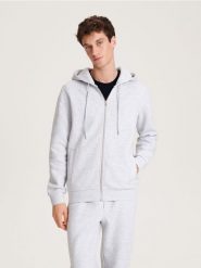 Rozpinana bluza z kapturem - jasnoszary. Szare bluzy męskie Reserved, l, bez wzorów, z bawełny, z kapturem. Za 139.99 zł.