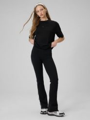 4F Legginsy z rozszerzanymi nogawkami damskie - czarne XL. Czarne legginsy damskie 4f, xl, bez wzorów, z bawełny. Za 129.99 zł.