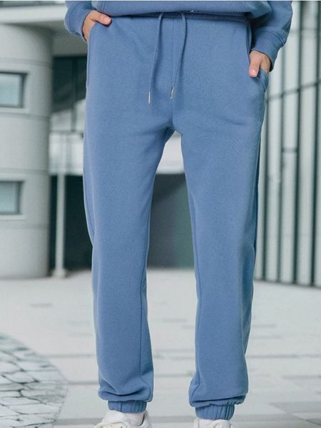 Spodnie dresowe jogger - niebieski. Niebieskie spodnie dresowe damskie Sinsay, l, bez wzorów, z dresówki. Za 24.99 zł.