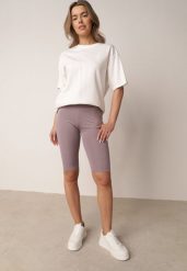 Jasnofioletowe Szorty Kolarki z Wysokim Stanem i Modelującym Pasem Toadgrass. Fioletowe szorty damskie Born2be, l, bez wzorów, eleganckie, z podwyższonym stanem. Za 39.99 zł.